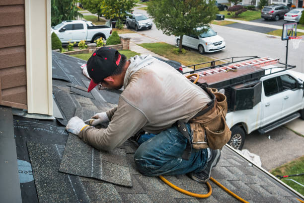 Professional Roof Replacement technician working in Huffman, TX